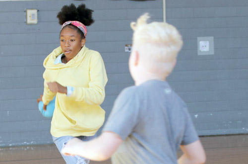 Two students running in the gym for exercise